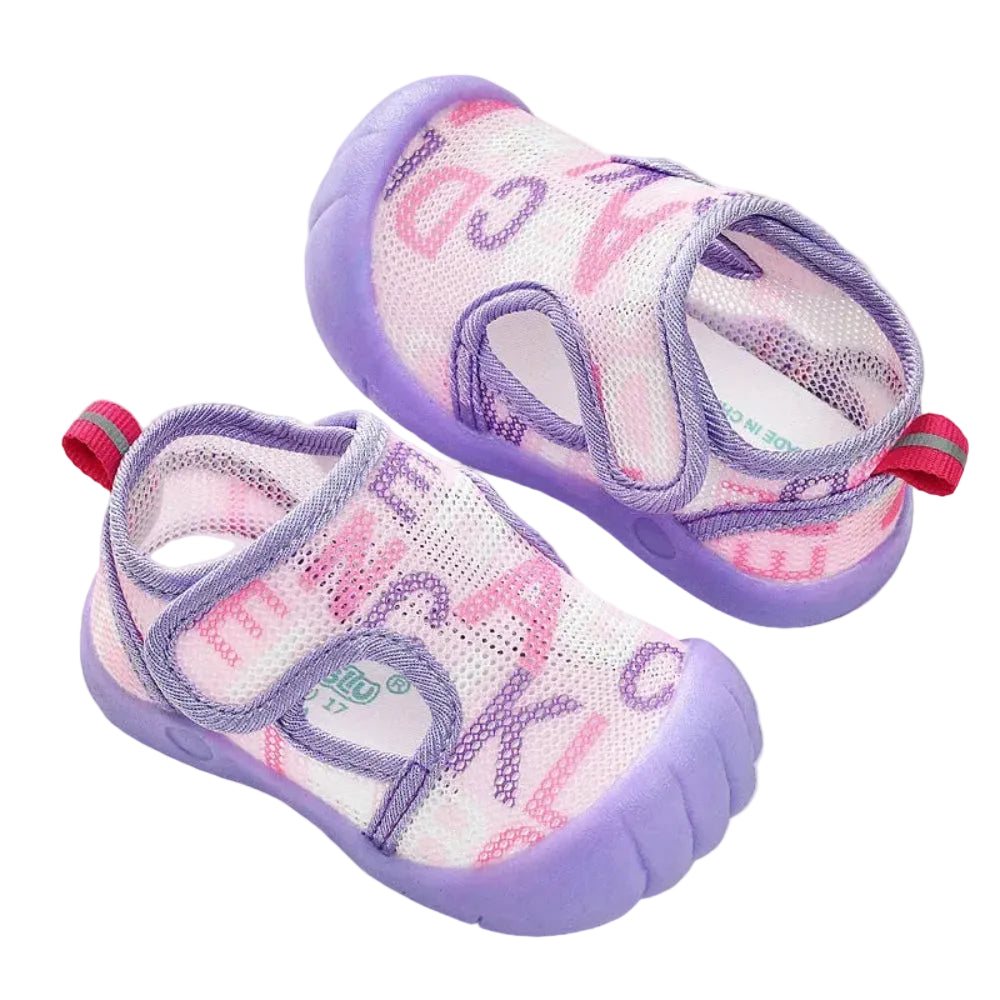 Pair of children's shoes with pink and purple design on a white background